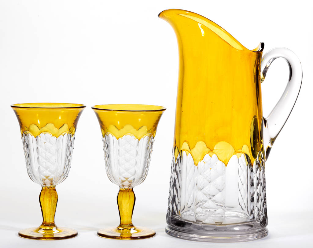 ADORIA – AMBER-STAINED DRINKING ARTICLES, LOT OF THREE