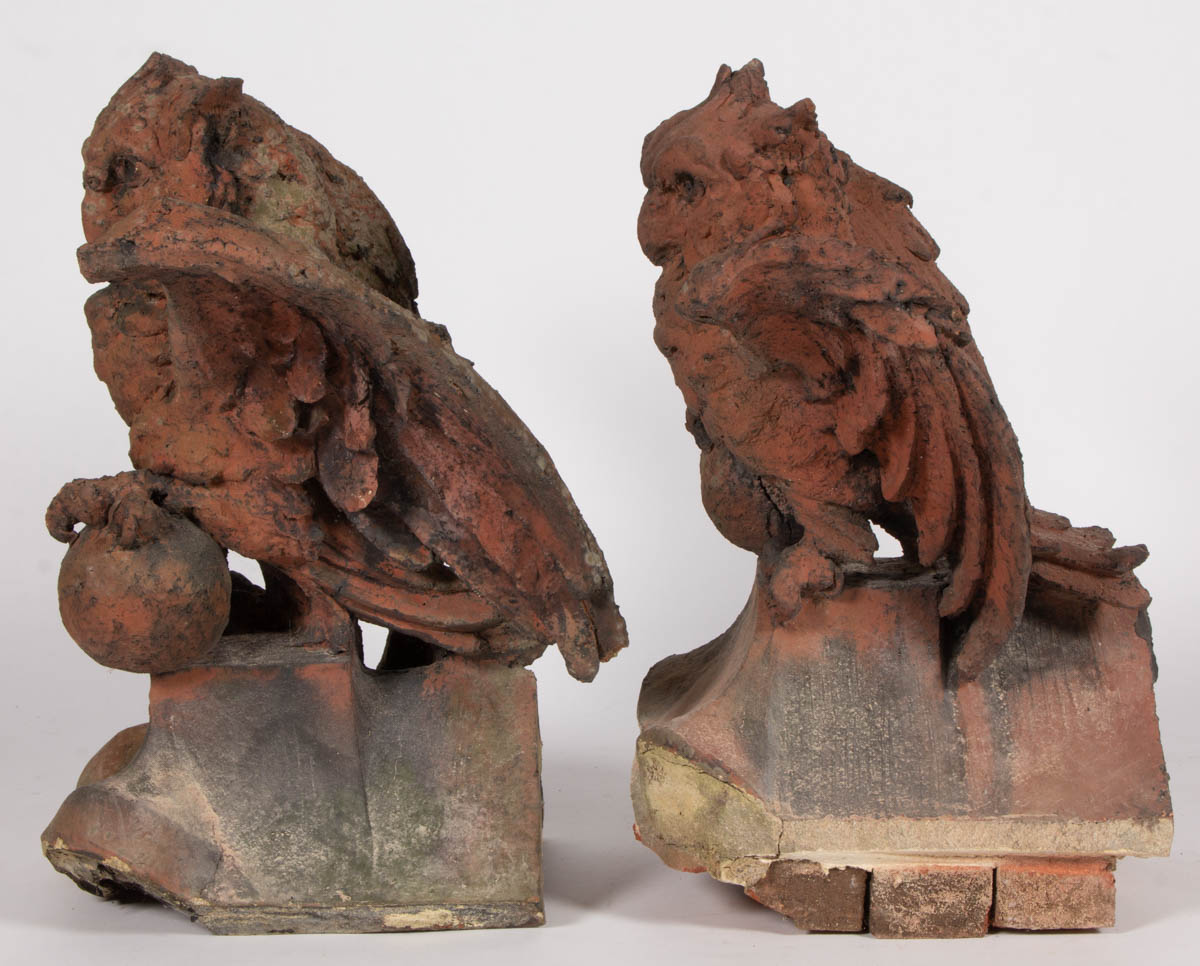 PENNSYLVANIA-ATTRIBUTED TERRACOTTA FIGURAL PAIR OF ROOF TILE FINIALS