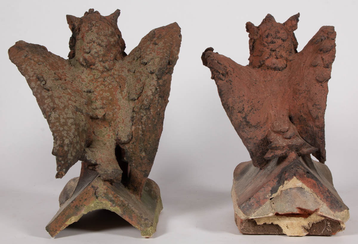 PENNSYLVANIA-ATTRIBUTED TERRACOTTA FIGURAL PAIR OF ROOF TILE FINIALS