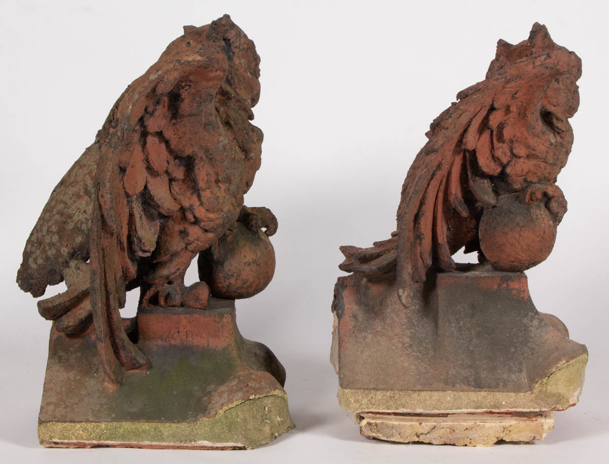 PENNSYLVANIA-ATTRIBUTED TERRACOTTA FIGURAL PAIR OF ROOF TILE FINIALS