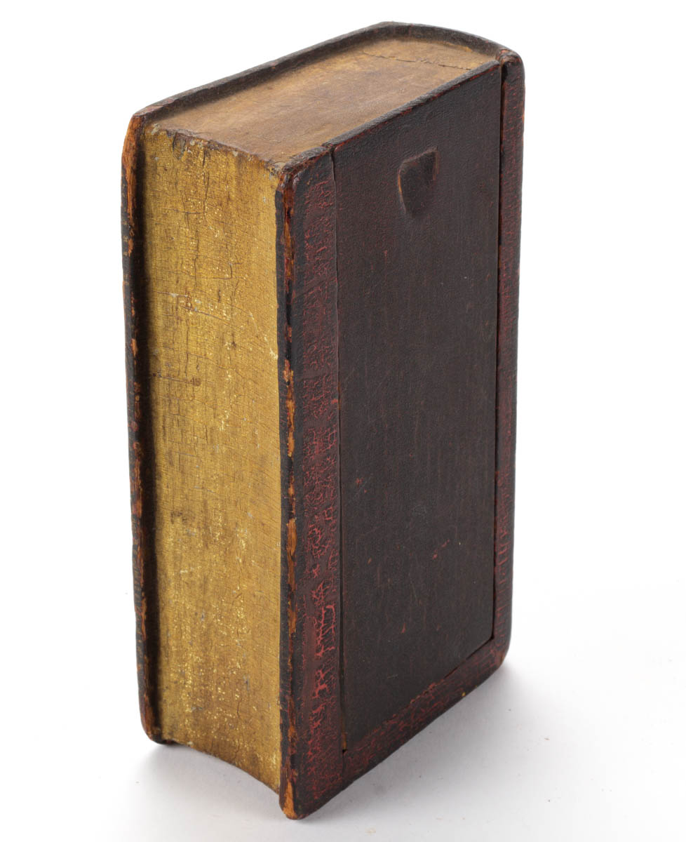AMERICAN CARVED AND PAINTED PINE BOOK-FORM SLIDE-TOP BOX