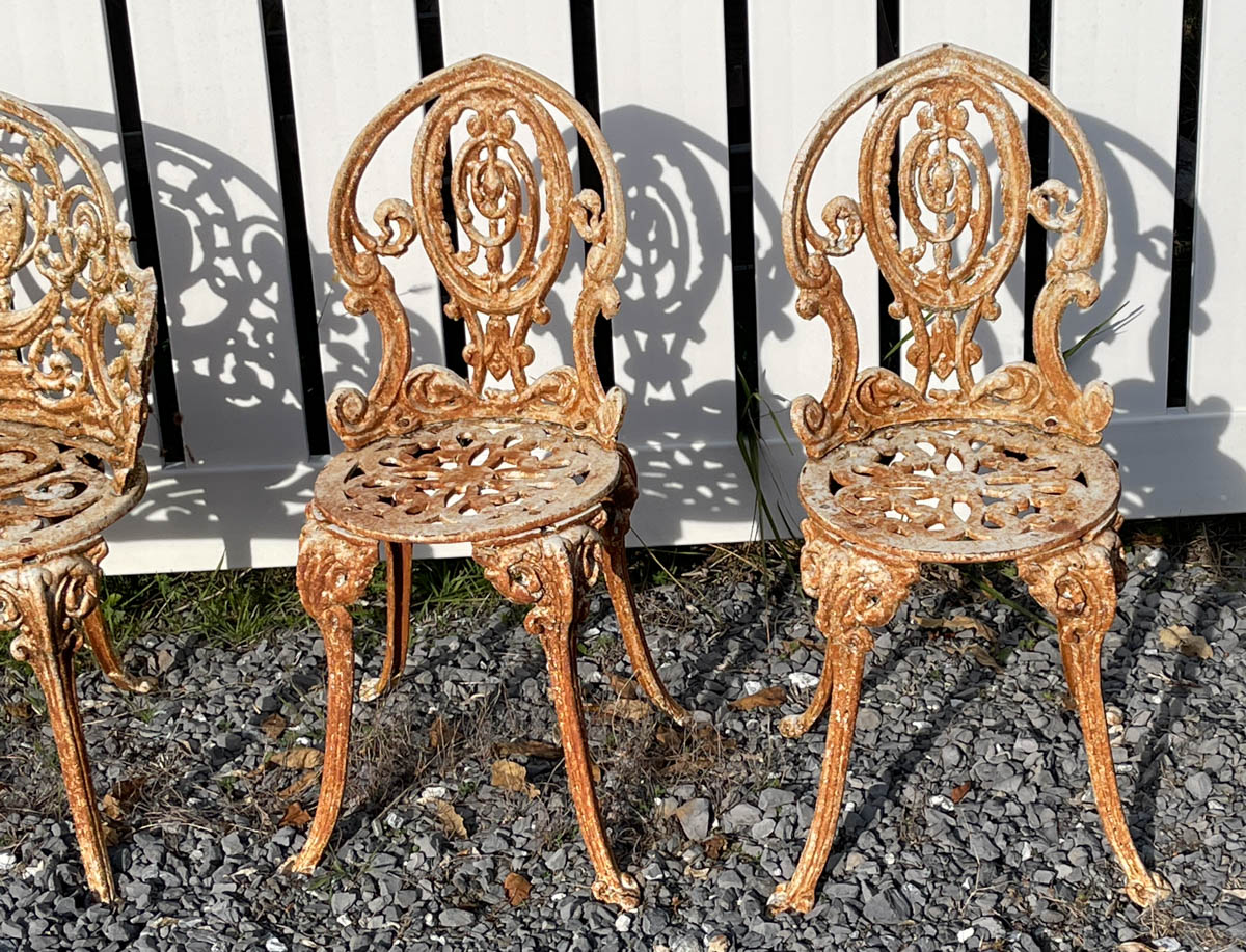 VICTORIAN PAINTED CAST-IRON GARDEN BENCH AND CHAIRS, LOT OF FOUR