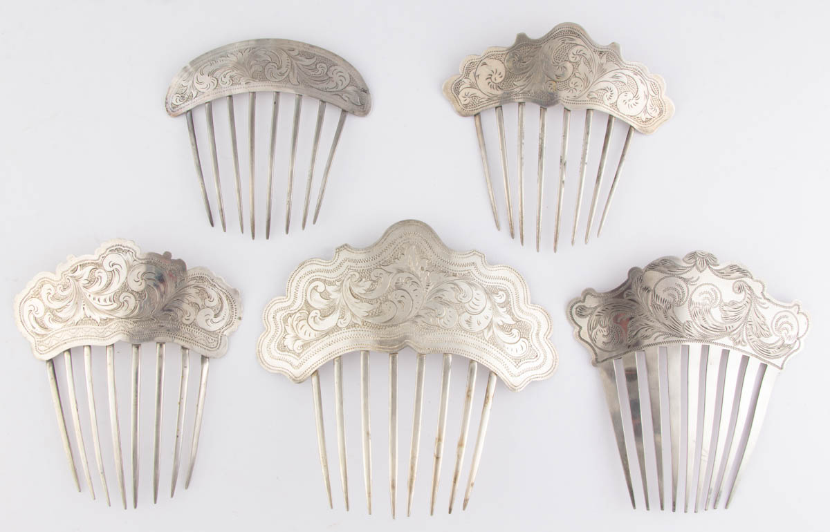 AMERICAN ENGRAVED-DECORATED SILVER HAIR COMBS, LOT OF FIVE