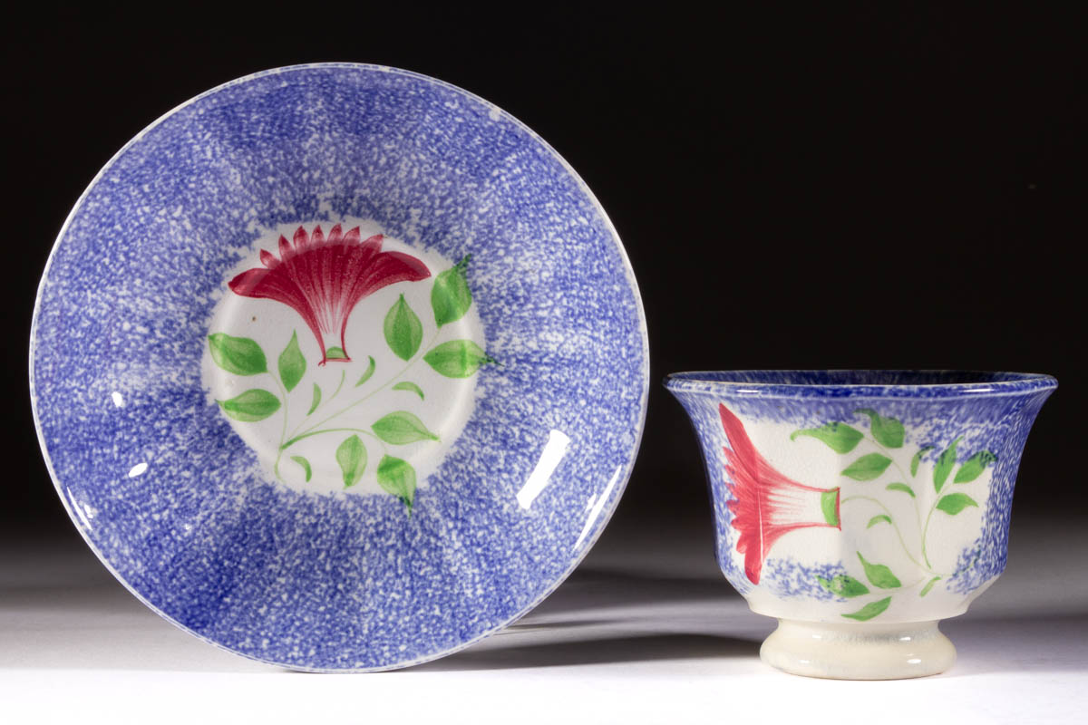 ENGLISH SPATTERWARE THISTLE CERAMIC CUP AND SAUCER SET