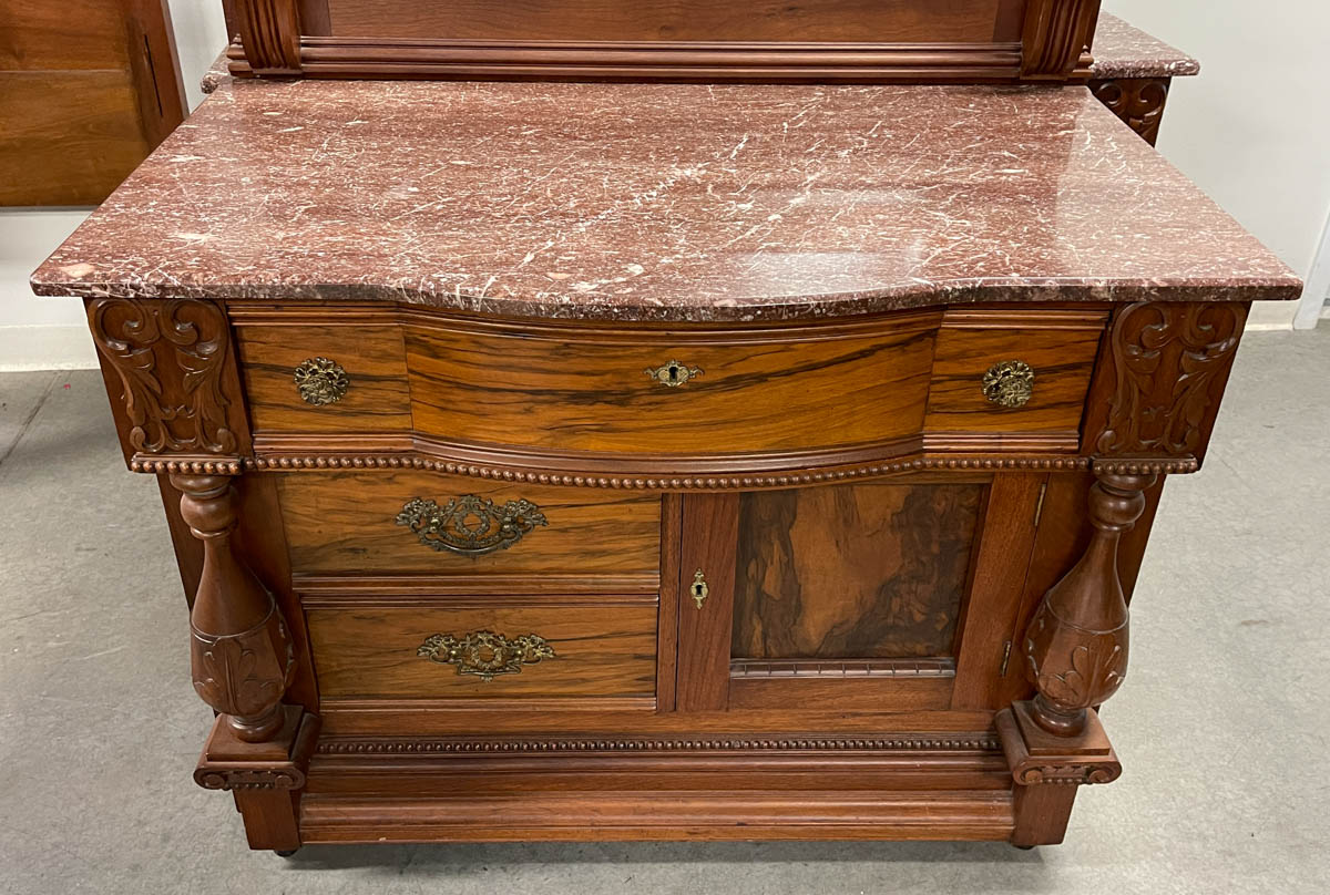 OUTSTANDING AMERICAN VICTORIAN CARVED WALNUT MARBLE-TOP MONUMENTAL THREE-PIECE BEDROOM SUITE
