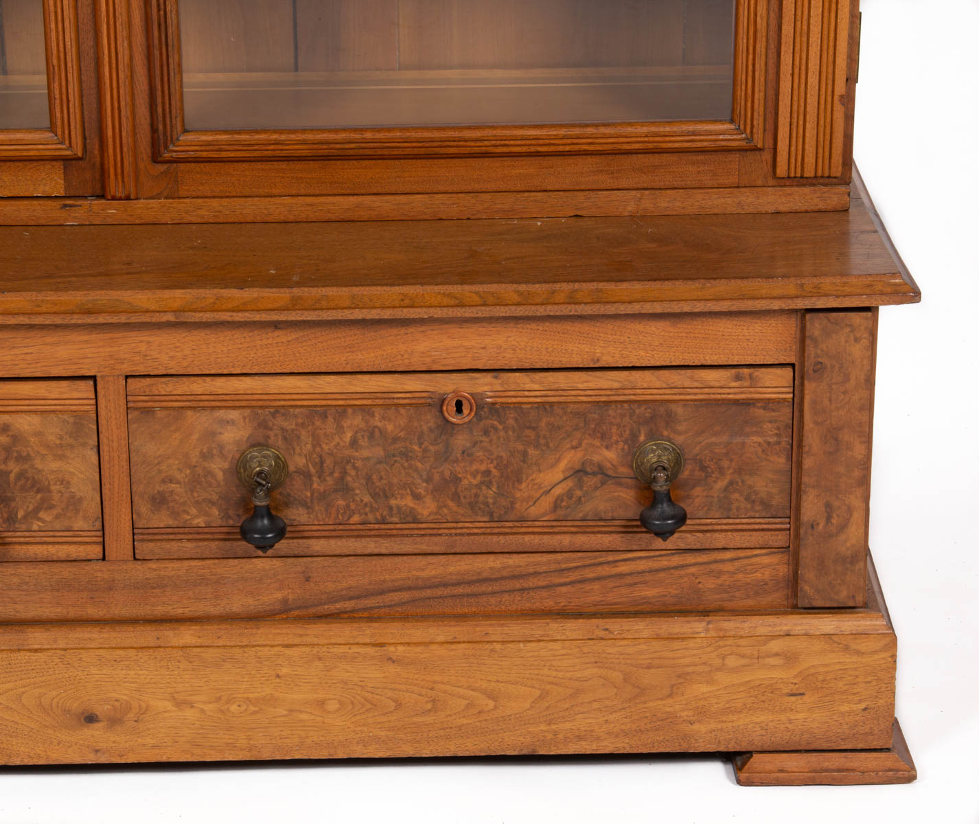 AMERICAN VICTORIAN CARVED WALNUT STEP-BACK BOOKCASE