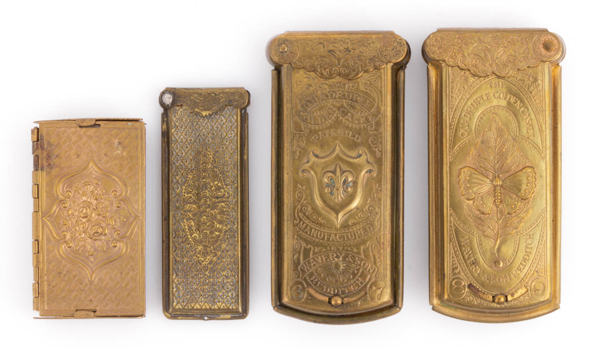 W. AVERY & SON AND OTHER BRASS FIGURAL SEWING NEEDLE CASES, LOT OF FOUR