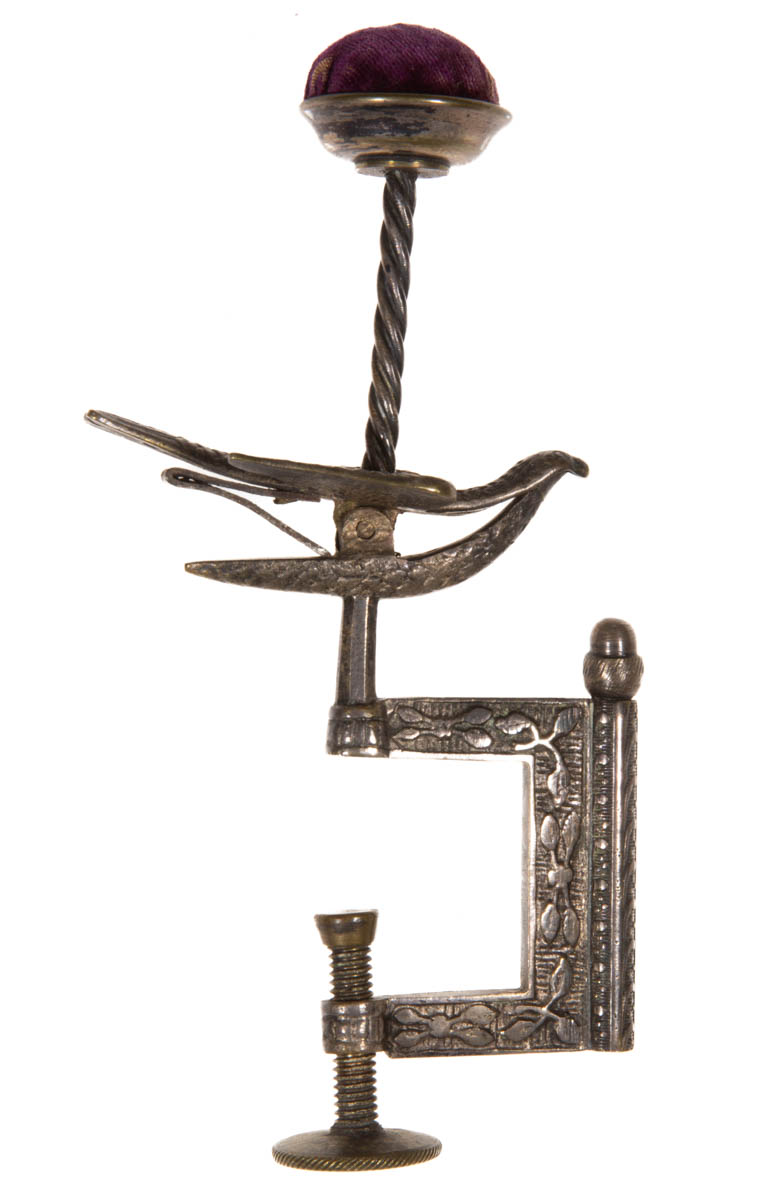 ENGLISH SILVER-PLATED CAST-BRASS AND METAL SEWING BIRD CLAMP WITH NEEDLE CASE