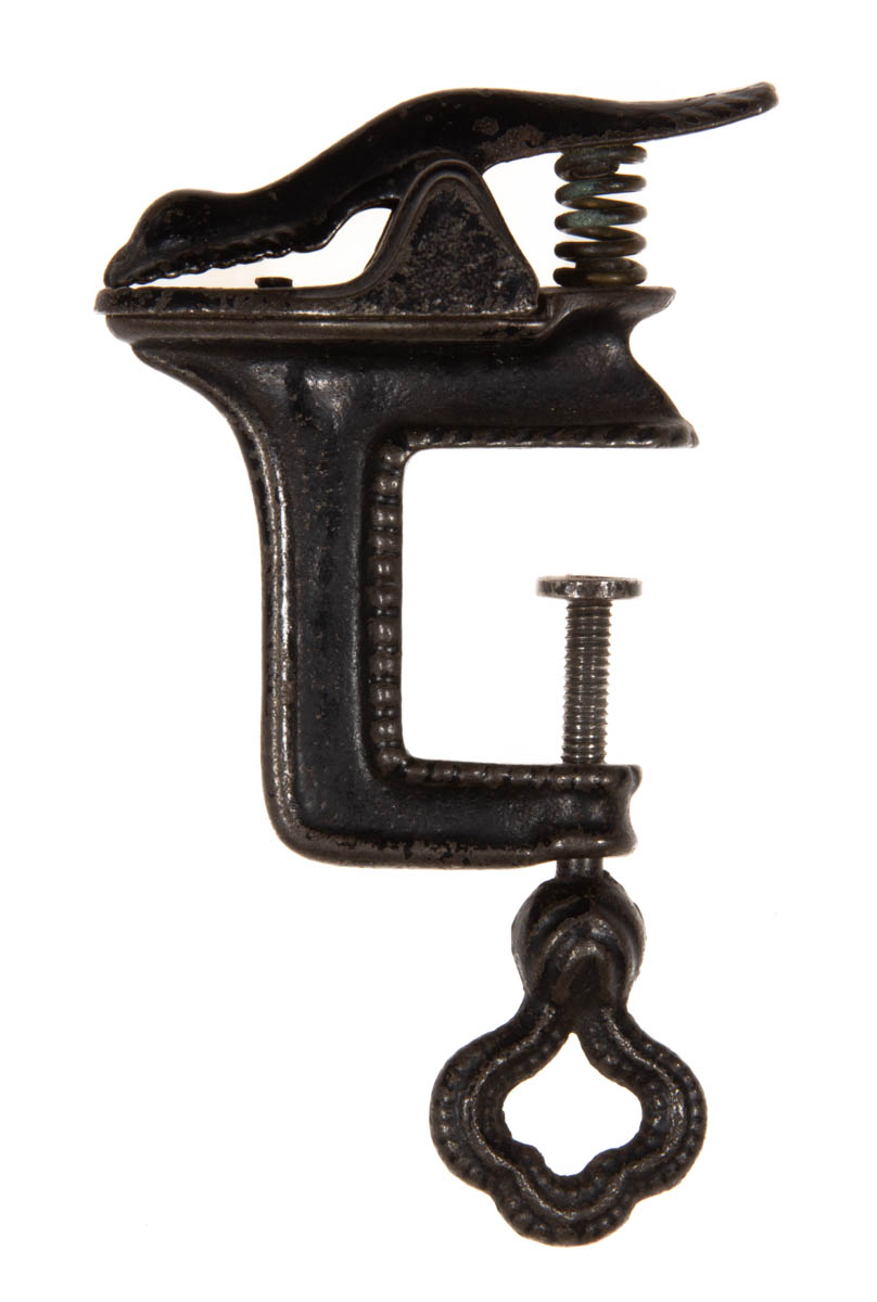 CAST-IRON “THE WORM” FIGURAL SEWING CLAMP