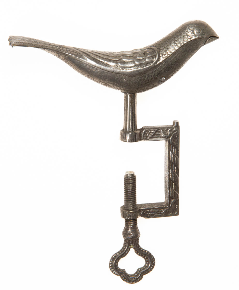 SILVER-PLATED STAMPED AND CAST-METAL FIGURAL SEWING BIRD CLAMP