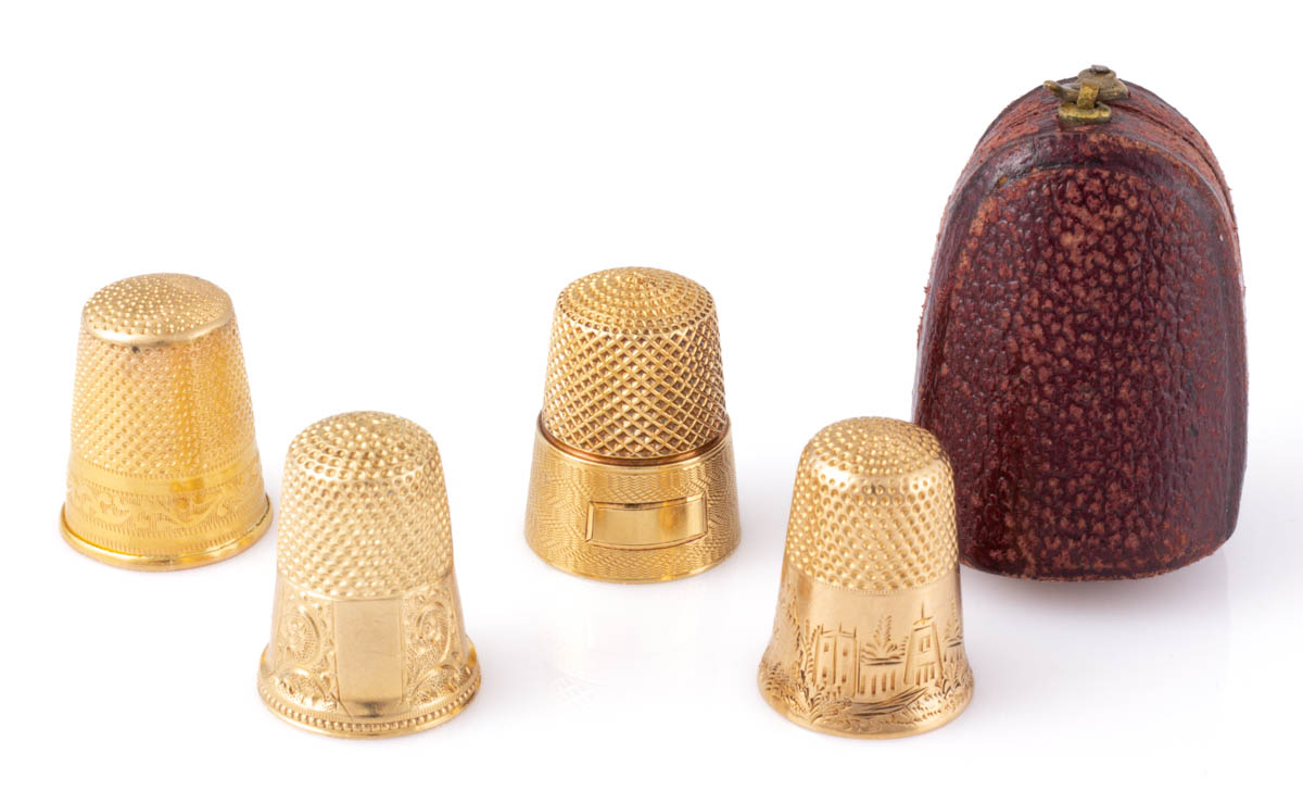 ASSORTED 18K YELLOW GOLD SEWING THIMBLES, LOT OF FOUR