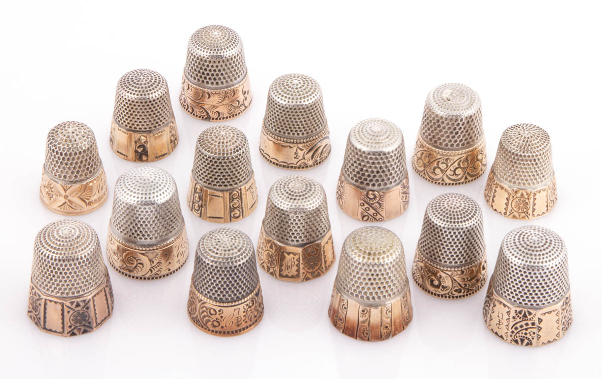 ASSORTED STERN STERLING SILVER WITH GOLD BAND SEWING THIMBLES, LOT OF 15