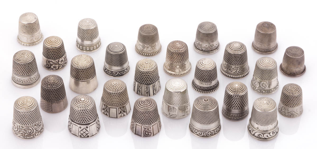 GOLDSMITH, STERN & CO. STERLING SILVER SEWING THIMBLES, LOT OF 25