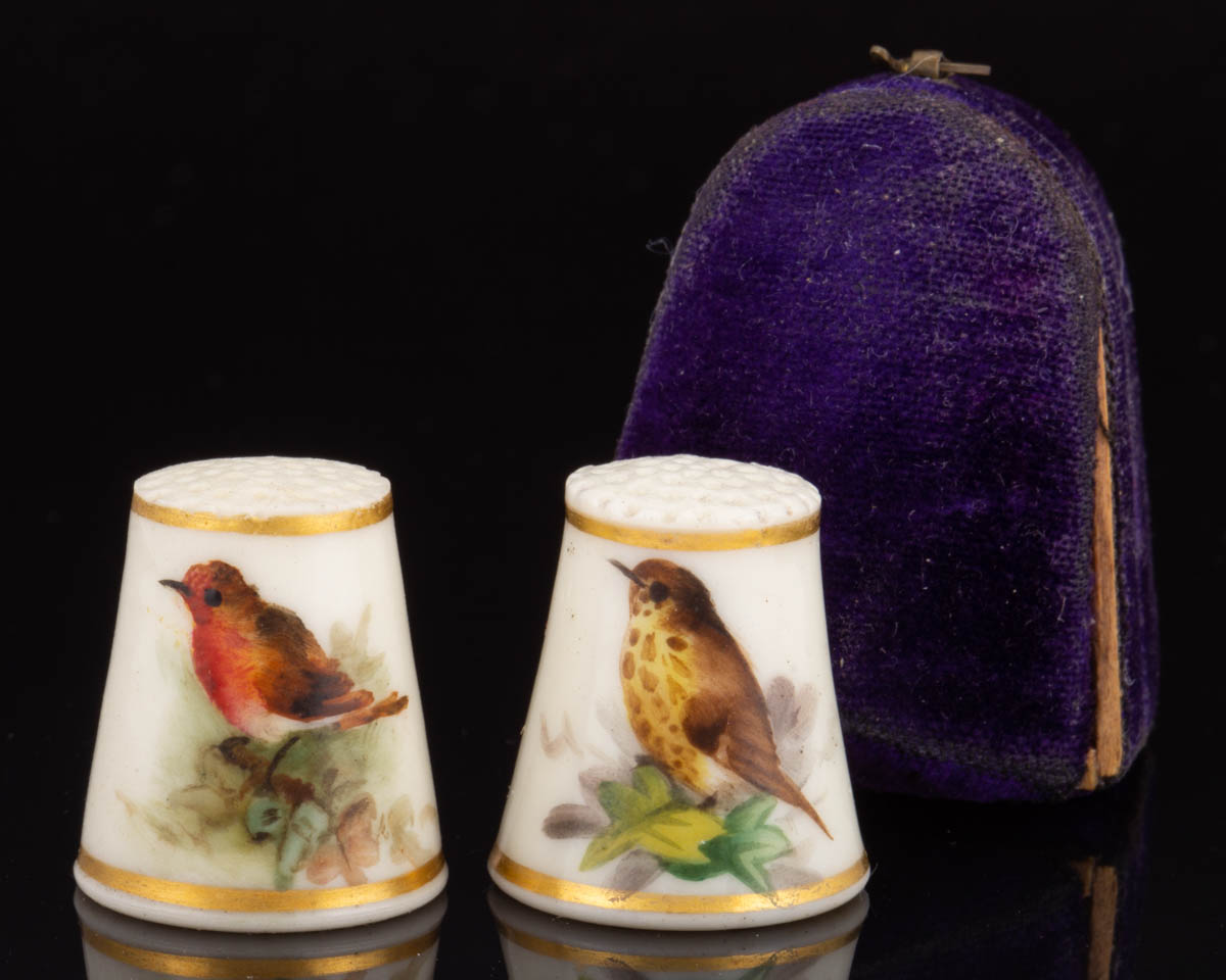 ENGLISH ROYAL WORCESTER BIRD MOTIF PORCELAIN SEWING THIMBLES, LOT OF TWO