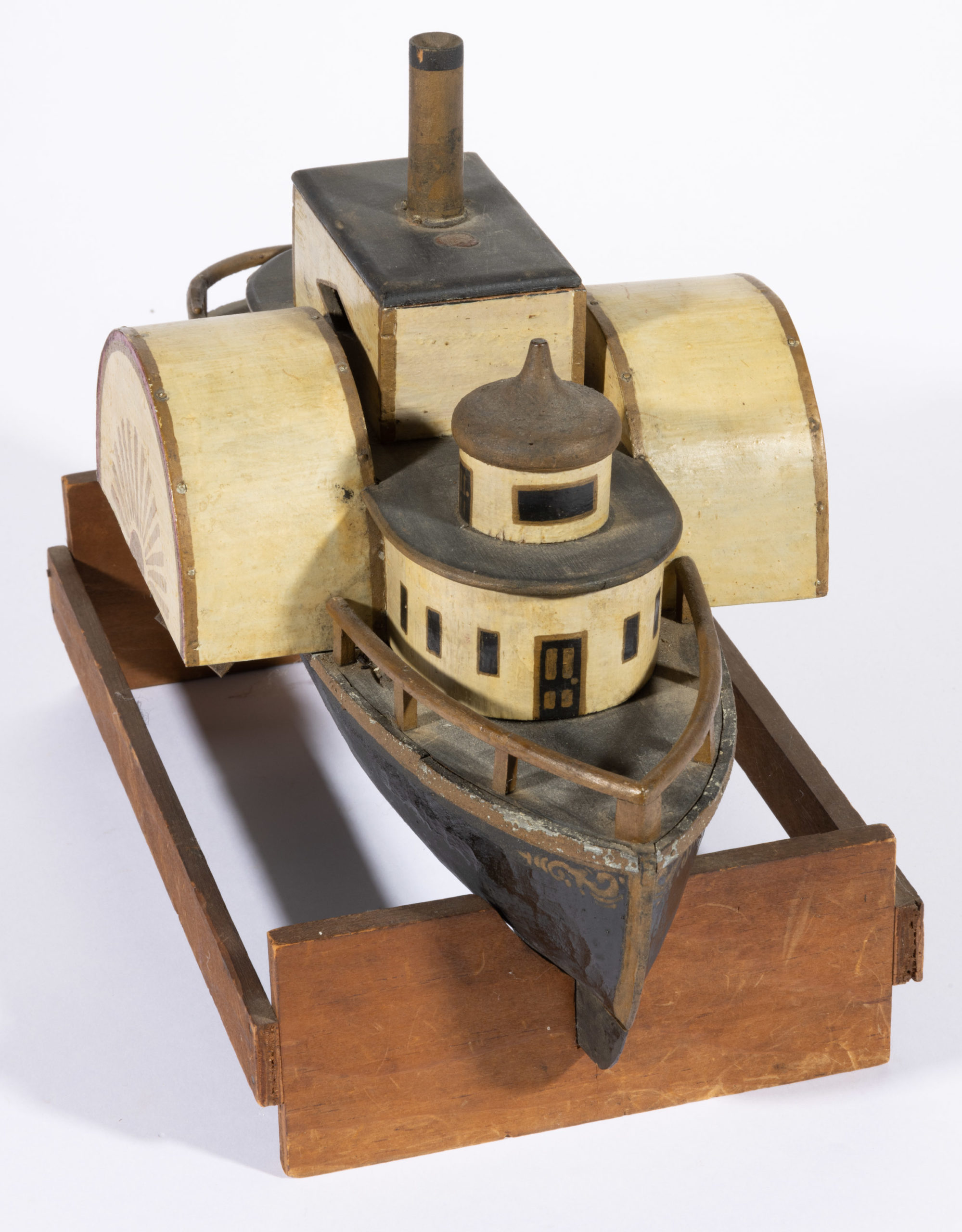 AMERICAN PAINTED WOOD AND TIN STEAM-POWERED PADDLEWHEEL SHIP TOY,