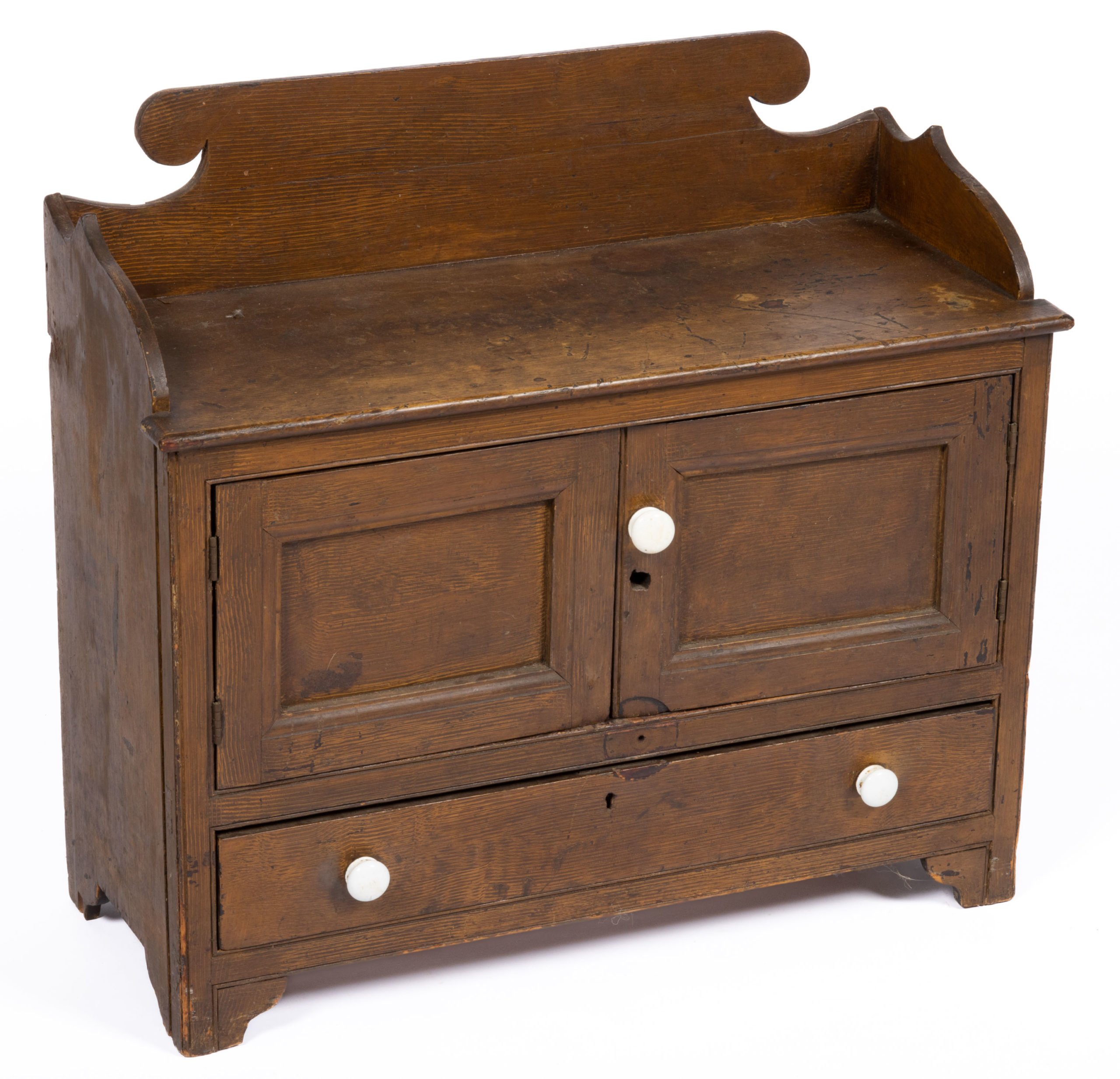 AMERICAN PAINT-DECORATED PINE CHILD’S CUPBOARD,