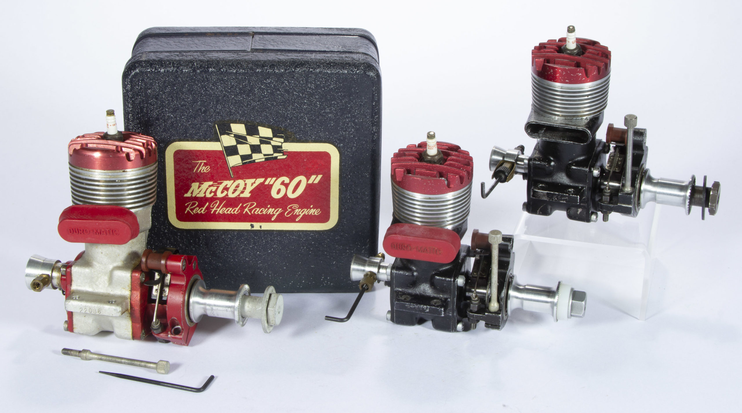 DURO-MATIC PRODUCTS MCCOY ASSORTED “RED HEAD” MODEL AIRPLANE ENGINES, LOT OF THREE,