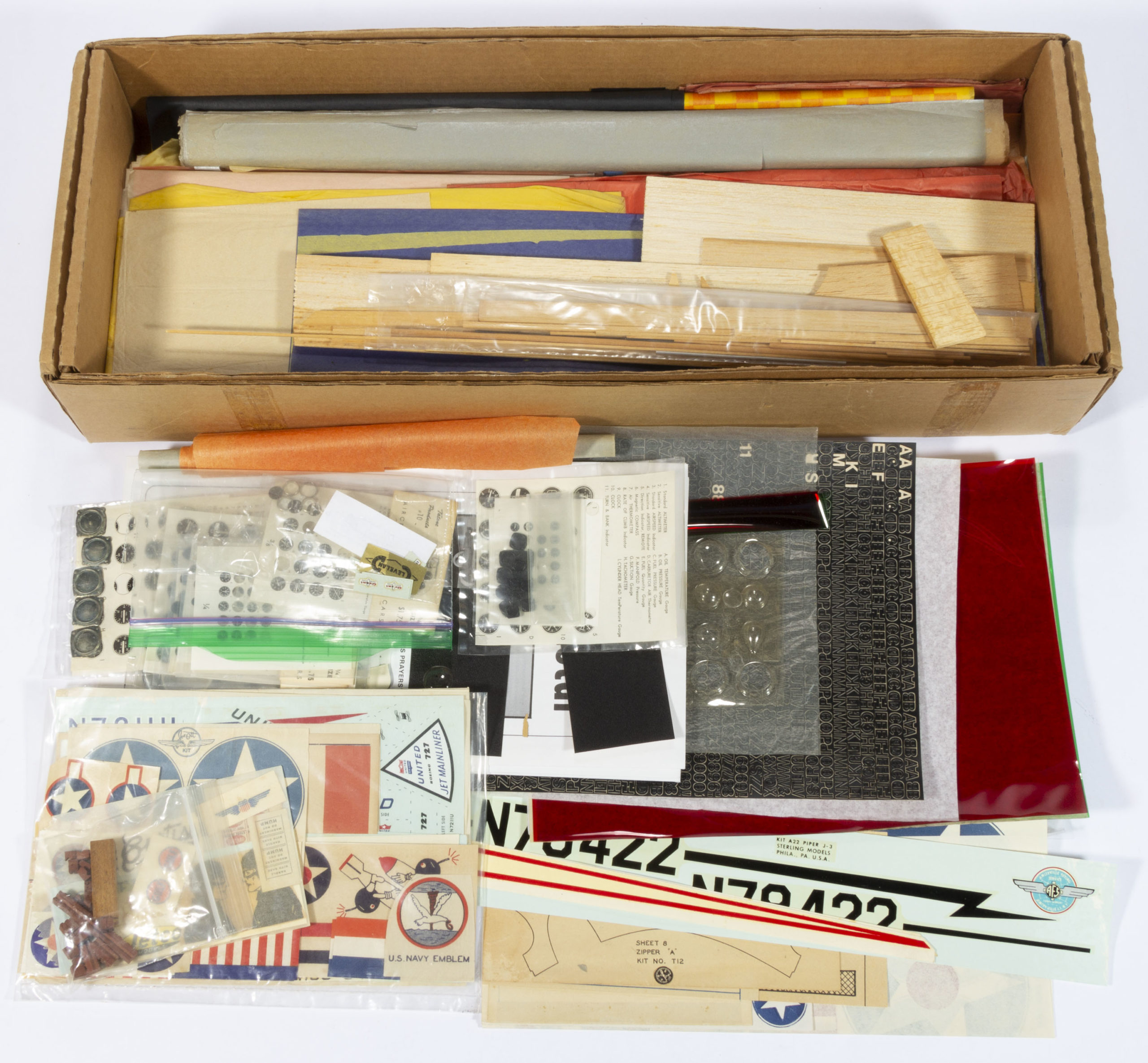 ASSORTED MODEL AIRPLANE DECORATING MATERIALS AND OTHER ARTICLES, UNCOUNTED LOT,