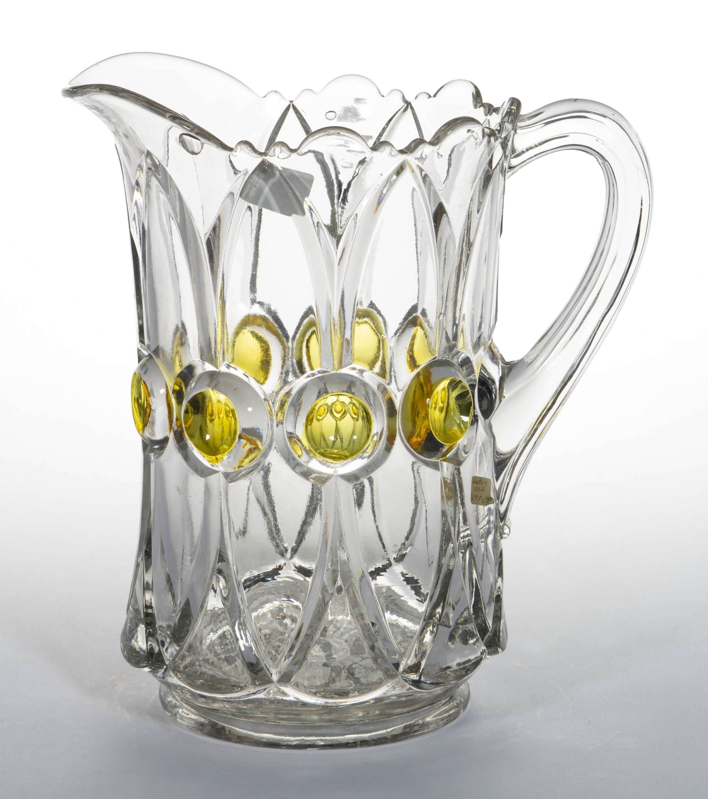 CRYSTAL’S NO. 21 / BULLSEYE AND ARROWHEAD – AMBER-STAINED WATER PITCHER,
