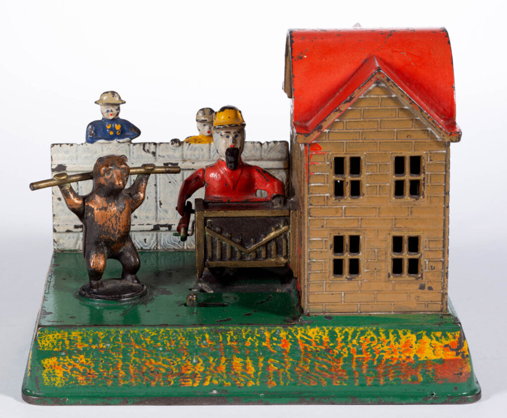 ORGAN GRINDER AND BEAR CAST IRON MECHANICAL BANK
